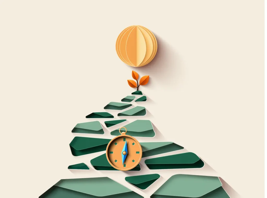 Paper-cut illustration of a compass on a stepping-stone path rising to a sunrise, representing consulting